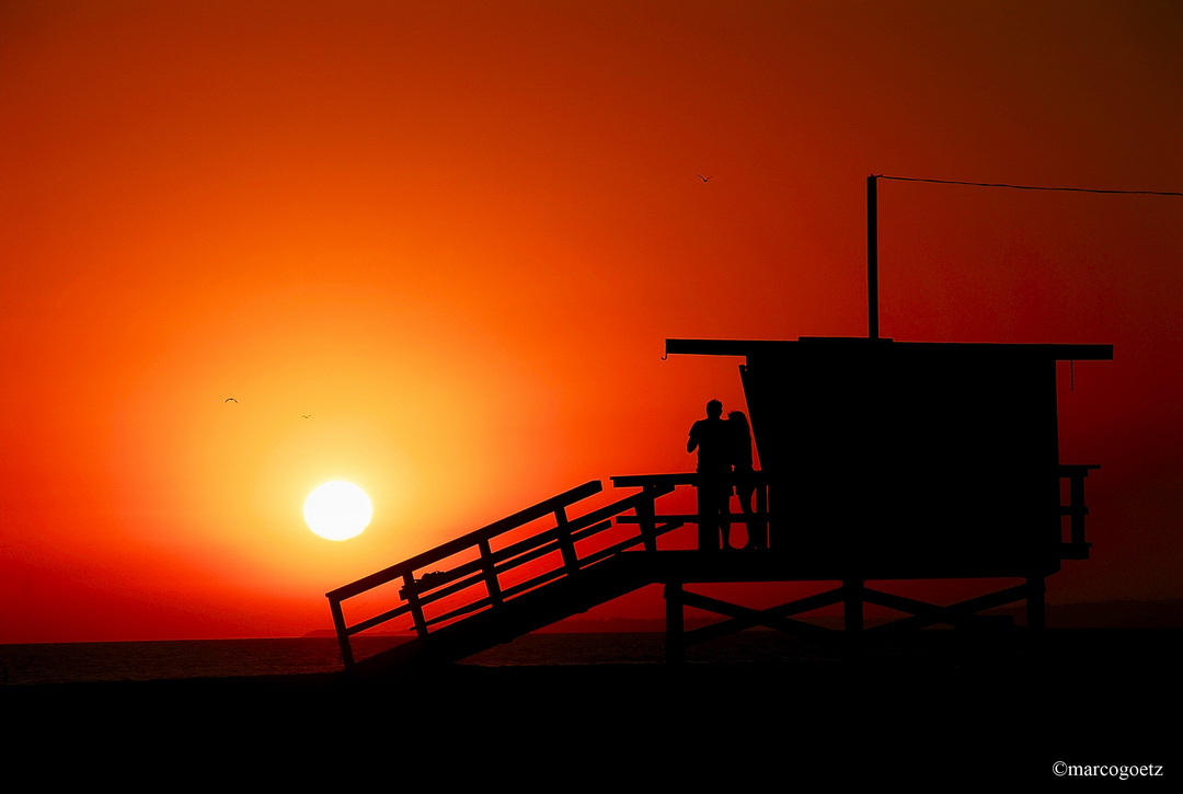 PAAR SONNENUNTERGANG VENICE BEACH CALIFORNIEN USA